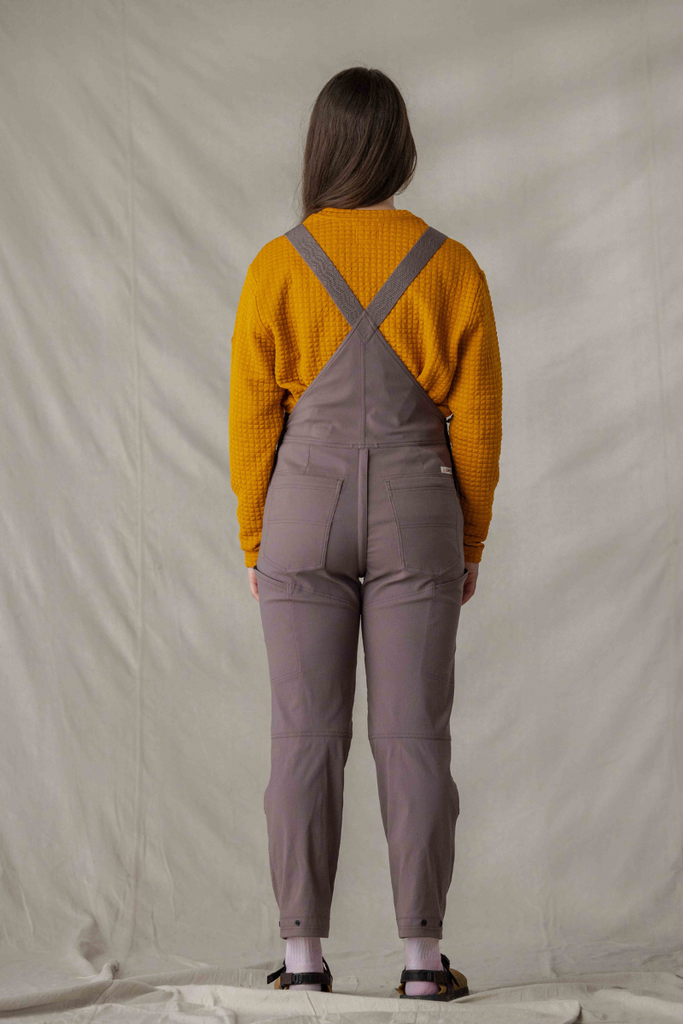 Back profile of Ecotrek overalls in Plum