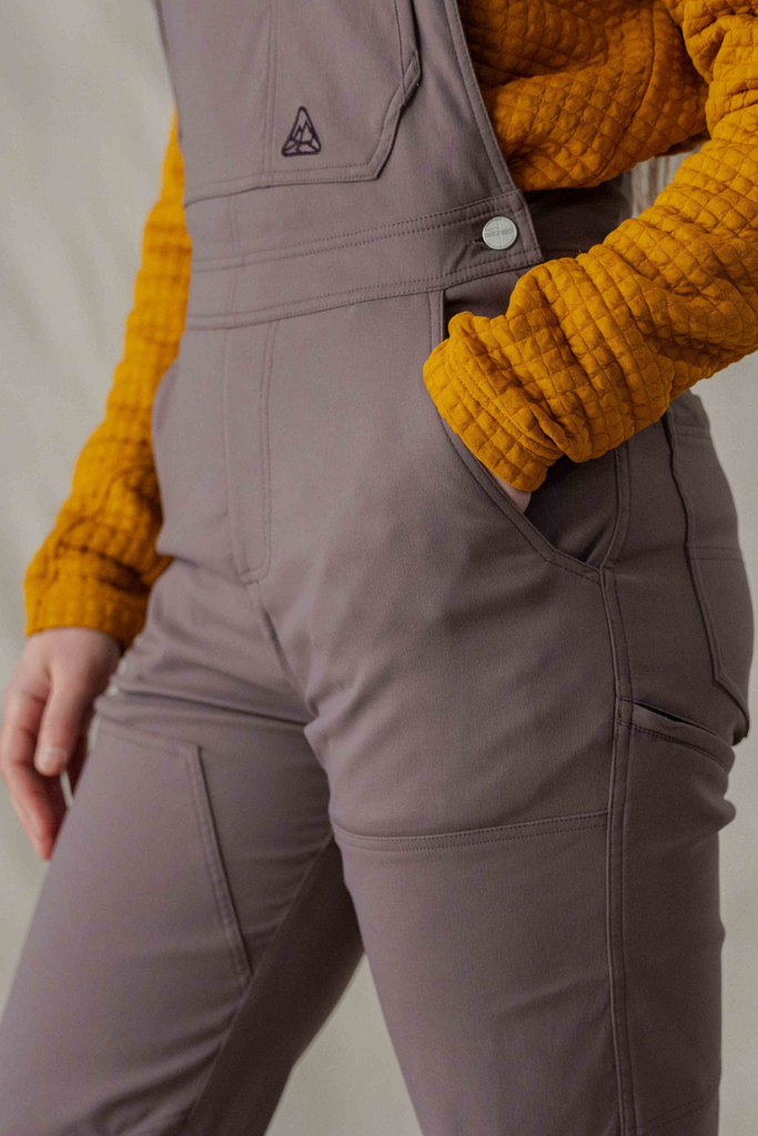 Photo of front hand pocket on Ecotrek overalls in Plum