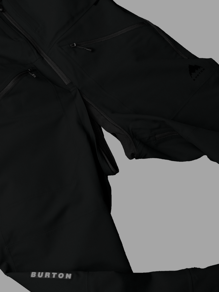 Flat lay of Burton bib in black highlighting an open GoFly Zipper.