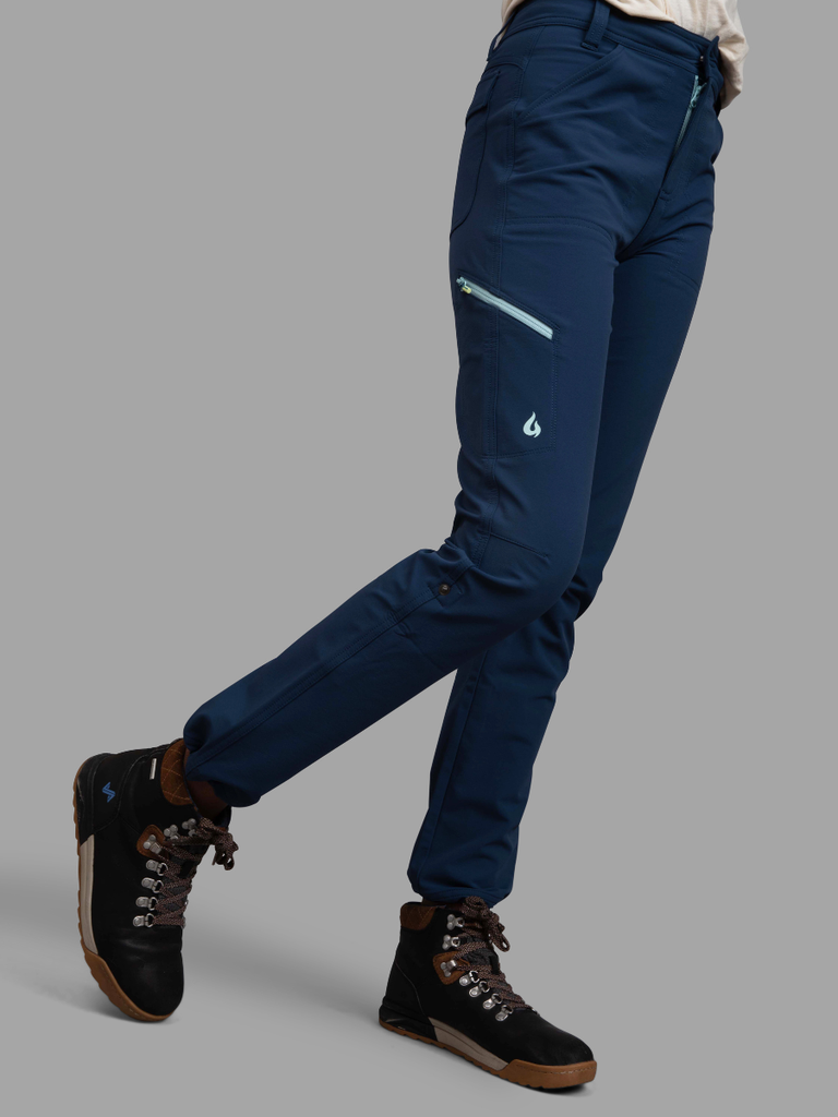 Side profile of model in Gnara Go There Pants in Navy